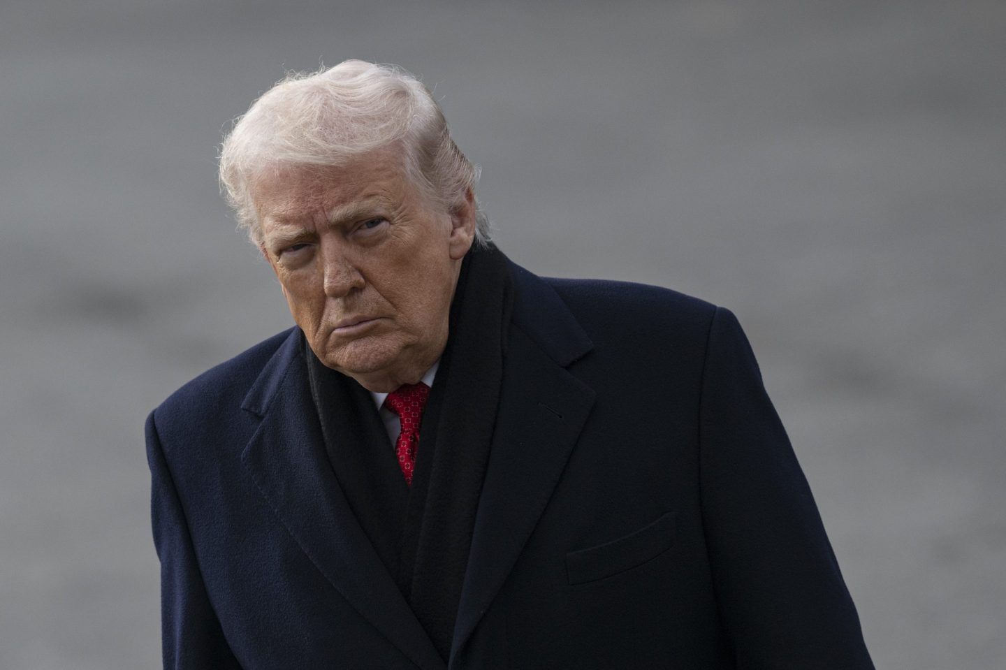 U.S. President Donald Trump speaks to the press, saying he's talking to NATO about Greenland, before he departs the White House en route Palm Beach, Florida on January 16, 2026, in Washington DC, United States.